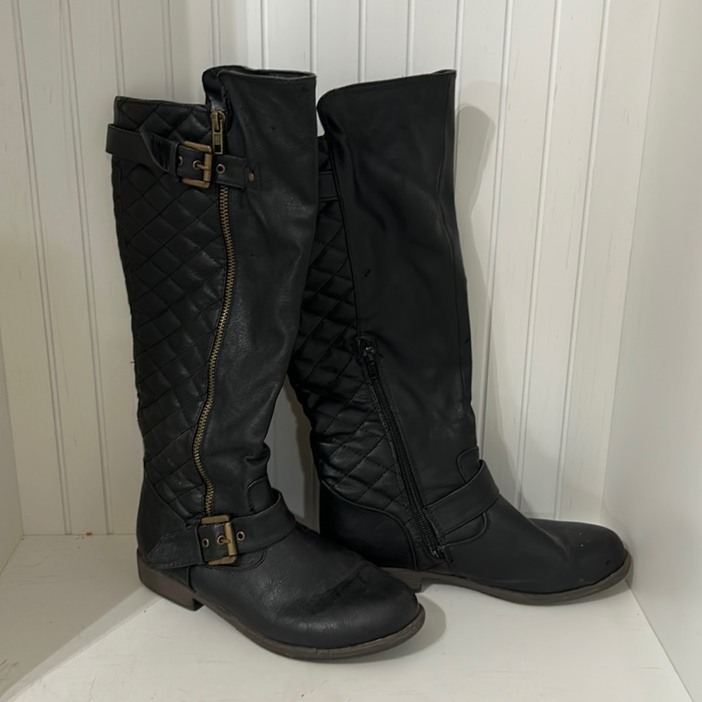 Black tall boots